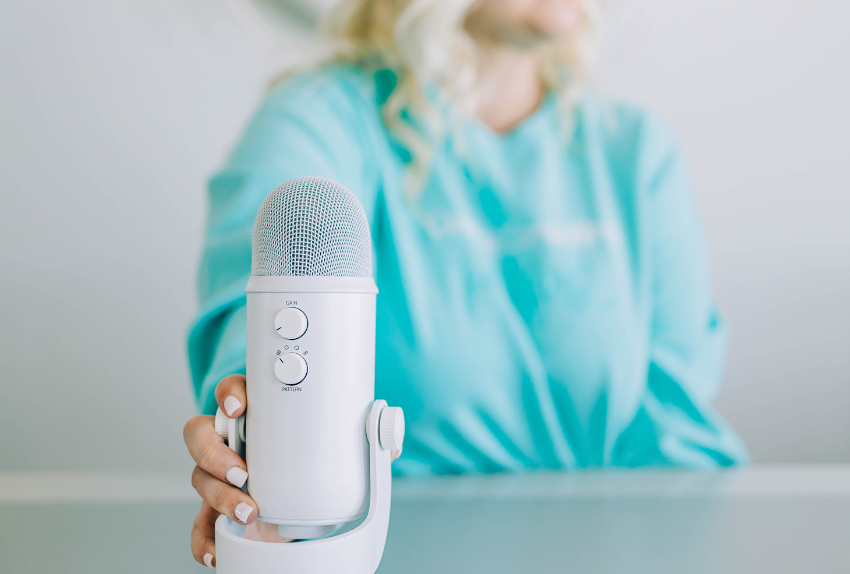 Lauren Ryan with a Microphone