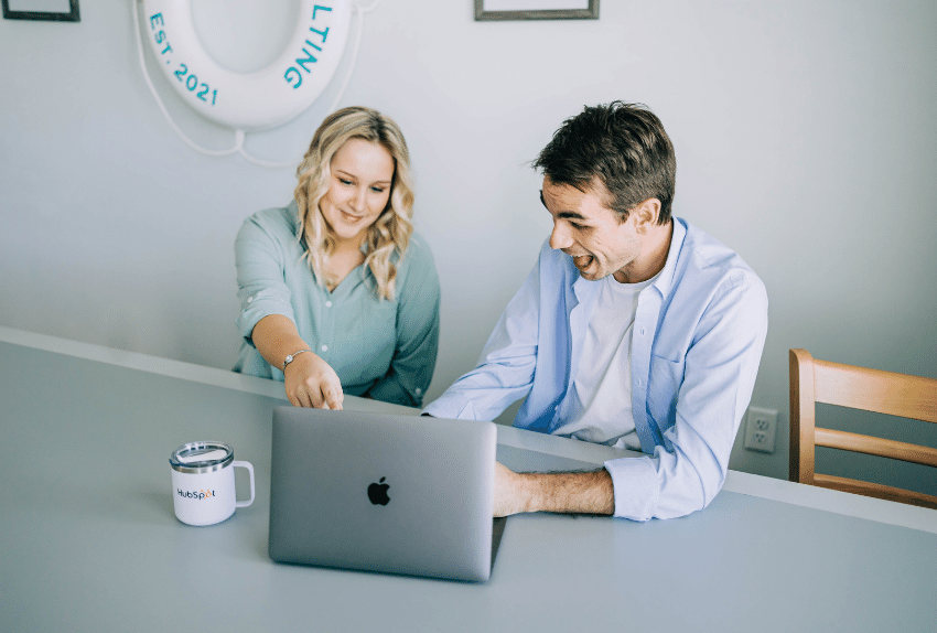 Two coworkers at a table